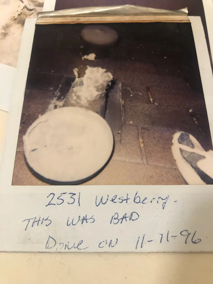 A Polaroid photo of a lint-caked roof vent, hand-captioned 2531 Westberry, this was bad, done on 11-11-96